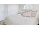 Cozy bedroom showcasing a comfortable bed, a storage closet, and a sunny window at 1533 Lanterns Rest Rd. # 304, Myrtle Beach, SC 29579