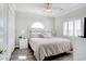 Bright bedroom with a ceiling fan, arch window, light-toned walls, and a well-lit interior at 1533 Lanterns Rest Rd. # 304, Myrtle Beach, SC 29579