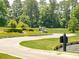 Scenic view of the golf course with a golf cart on the path at 1533 Lanterns Rest Rd. # 304, Myrtle Beach, SC 29579