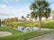Golf course view with a pond and lush green landscaping at 1533 Lanterns Rest Rd. # 304, Myrtle Beach, SC 29579