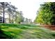 Scenic view of the grounds with lush green grass and mature trees at 1533 Lanterns Rest Rd. # 304, Myrtle Beach, SC 29579