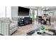 Cozy living room featuring wood floors, a fireplace, and comfortable seating at 1533 Lanterns Rest Rd. # 304, Myrtle Beach, SC 29579