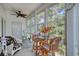 Enclosed sunroom with wicker seating and outdoor views at 1533 Lanterns Rest Rd. # 304, Myrtle Beach, SC 29579