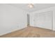 This bedroom offers neutral carpeting and a ceiling fan for added comfort, complemented by ample closet space at 1851 Colony Dr. # 4-F, Surfside Beach, SC 29575