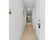 Bright hallway features tile flooring and leads to an open living space at 1851 Colony Dr. # 4-F, Surfside Beach, SC 29575
