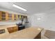 Cozy kitchen with wooden cabinets, stainless steel refrigerator and stone countertop at 1851 Colony Dr. # 4-F, Surfside Beach, SC 29575