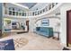 Inviting lobby featuring travertine floors, high ceilings, and murals creating an upscale resort atmosphere at 2000 N Ocean Blvd. # 502, Myrtle Beach, SC 29577