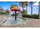 Fun splash pad with water fountain feature, surrounded by lush landscaping and comfortable lounge chairs at 2000 N Ocean Blvd. # 502, Myrtle Beach, SC 29577