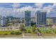 Aerial view of resort buildings with an outdoor pool, palm trees, and beach access at 2310 N Ocean Blvd. # 308, Myrtle Beach, SC 29572