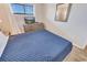 Bedroom with a modern dresser, flatscreen TV, and bright natural lighting at 2310 N Ocean Blvd. # 308, Myrtle Beach, SC 29572