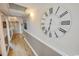 Inviting hallway with decor and stylish Roman numeral clock at 2310 N Ocean Blvd. # 308, Myrtle Beach, SC 29572