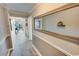Long hallway with a large mirror leading to outside view at 2310 N Ocean Blvd. # 308, Myrtle Beach, SC 29572