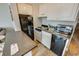 Efficient kitchen space featuring modern appliances, counter space, and white cabinetry at 2310 N Ocean Blvd. # 308, Myrtle Beach, SC 29572