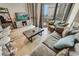 Comfortable living room with waterfront view, sliding glass doors and casual furnishings at 2310 N Ocean Blvd. # 308, Myrtle Beach, SC 29572