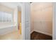An open ensuite bathroom with a view into the walk-in closet at 237 Copperwood Loop, Conway, SC 29526