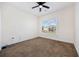 Bedroom with neutral carpet and paint and a large window with neighborhood views at 237 Copperwood Loop, Conway, SC 29526