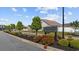 Welcoming entrance to the Heartwood community, featuring lush landscaping and manicured lawns at 237 Copperwood Loop, Conway, SC 29526