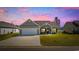 Charming single-story home with a well-manicured lawn and inviting front entrance at 237 Copperwood Loop, Conway, SC 29526