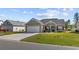 Charming single-story home with a well-manicured lawn and inviting front entrance at 237 Copperwood Loop, Conway, SC 29526