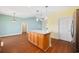 Spacious kitchen island with seating, ample counter space, and natural light at 237 Copperwood Loop, Conway, SC 29526