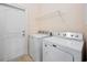 Functional laundry room featuring a washer, dryer, and storage shelves at 237 Copperwood Loop, Conway, SC 29526