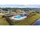 Inviting community pool with plenty of lounge chairs for residents to enjoy the sunshine at 237 Copperwood Loop, Conway, SC 29526