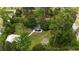 Aerial shot of house and overgrown yard with in-ground pool that needs work at 2560 Wise Rd., Conway, SC 29526