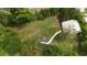 Aerial view of a property showing the backyard, inground pool and a small building at 2560 Wise Rd., Conway, SC 29526