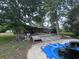 Large backyard with deck, above ground pool and lush landscaping at 2560 Wise Rd., Conway, SC 29526