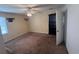 Bright bedroom with neutral carpet, ceiling fan, and natural light from the windows at 2560 Wise Rd., Conway, SC 29526