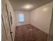Bedroom featuring neutral walls, stained carpet, and a window with natural light at 2560 Wise Rd., Conway, SC 29526