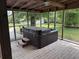 Hot tub on screened in back porch at 2560 Wise Rd., Conway, SC 29526