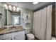 Well-maintained bathroom featuring a granite vanity, coordinated decor, and shower/tub combo at 2711 S Ocean Blvd. # 1917, North Myrtle Beach, SC 29582