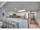 Bright kitchen with stainless steel appliances, a breakfast bar with seating, and ample counter space at 2711 S Ocean Blvd. # 1917, North Myrtle Beach, SC 29582
