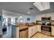 Well-equipped kitchen featuring updated appliances, granite countertops, and an open view to the living area at 2711 S Ocean Blvd. # 1917, North Myrtle Beach, SC 29582
