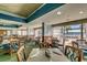 Bright restaurant with a view of the ocean and palm trees at 2711 S Ocean Blvd. # 1917, North Myrtle Beach, SC 29582