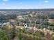 An aerial view of a home surrounded by lush landscapes, ponds and community amenities at 3053 Chesterwood Ct., Myrtle Beach, SC 29579