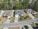 An aerial view showcases the home's location within a quiet, tree-lined neighborhood at 3053 Chesterwood Ct., Myrtle Beach, SC 29579
