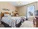 Bedroom with two beds, large window, neutral walls, hardwood furnishings, and carpeted floor at 3053 Chesterwood Ct., Myrtle Beach, SC 29579