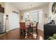 Breakfast nook with bay window, hardwood floors, storage closet, and views of the backyard at 3053 Chesterwood Ct., Myrtle Beach, SC 29579