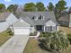 Aerial view of a charming home with a well-manicured lawn, and a two car garage at 3053 Chesterwood Ct., Myrtle Beach, SC 29579