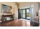 Elegant foyer featuring hardwood floors, high ceilings, and a decorative table with artistic accents at 3053 Chesterwood Ct., Myrtle Beach, SC 29579