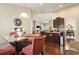 Kitchen with breakfast nook featuring seating and hardwood floors, open concept, and granite countertops at 3053 Chesterwood Ct., Myrtle Beach, SC 29579