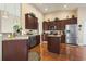 Gourmet kitchen with stainless steel appliances, granite countertops, ample cabinet space, and a kitchen island at 3053 Chesterwood Ct., Myrtle Beach, SC 29579