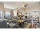 Open-concept living room with hardwood floors, comfortable seating, and views into the kitchen and dining areas at 3053 Chesterwood Ct., Myrtle Beach, SC 29579