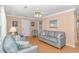 Cozy living room with comfortable seating and a decorative ceiling fan at 311 Surfside Dr., Surfside Beach, SC 29575