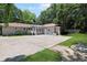 Wide backyard with patio and adjacent landscaped yard at 412 43Rd Ave. N, Myrtle Beach, SC 29577