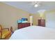 Bright bedroom featuring a television, hardwood furniture, and a comfortable bedspread at 412 43Rd Ave. N, Myrtle Beach, SC 29577