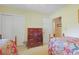 Bedroom view featuring twin beds, dresser, and closet with sliding doors at 412 43Rd Ave. N, Myrtle Beach, SC 29577