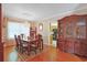 Elegant dining room featuring a chandelier, hardwood floors, and classic furnishings for formal entertaining at 412 43Rd Ave. N, Myrtle Beach, SC 29577